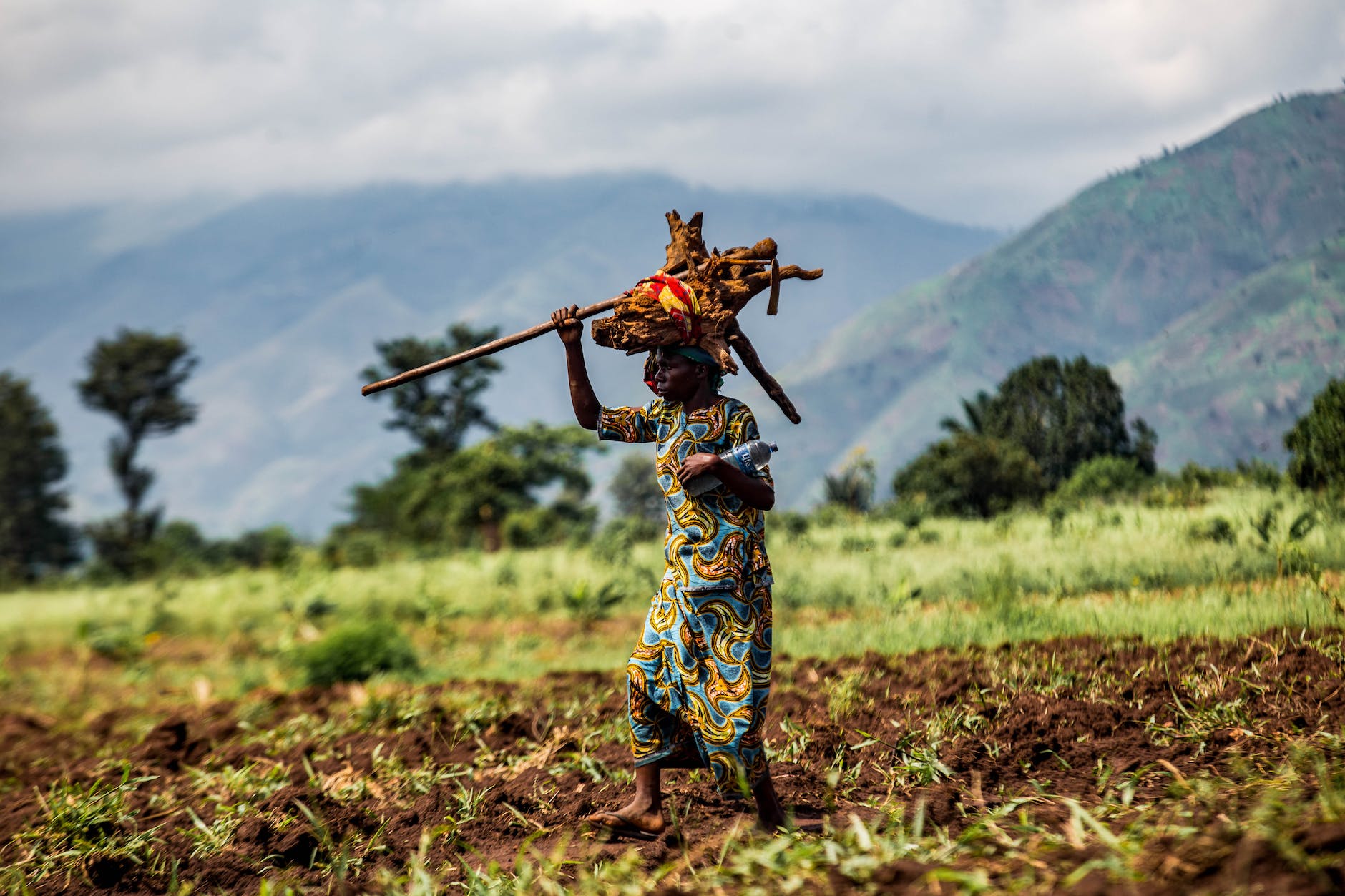 african woman carrying a load on her head